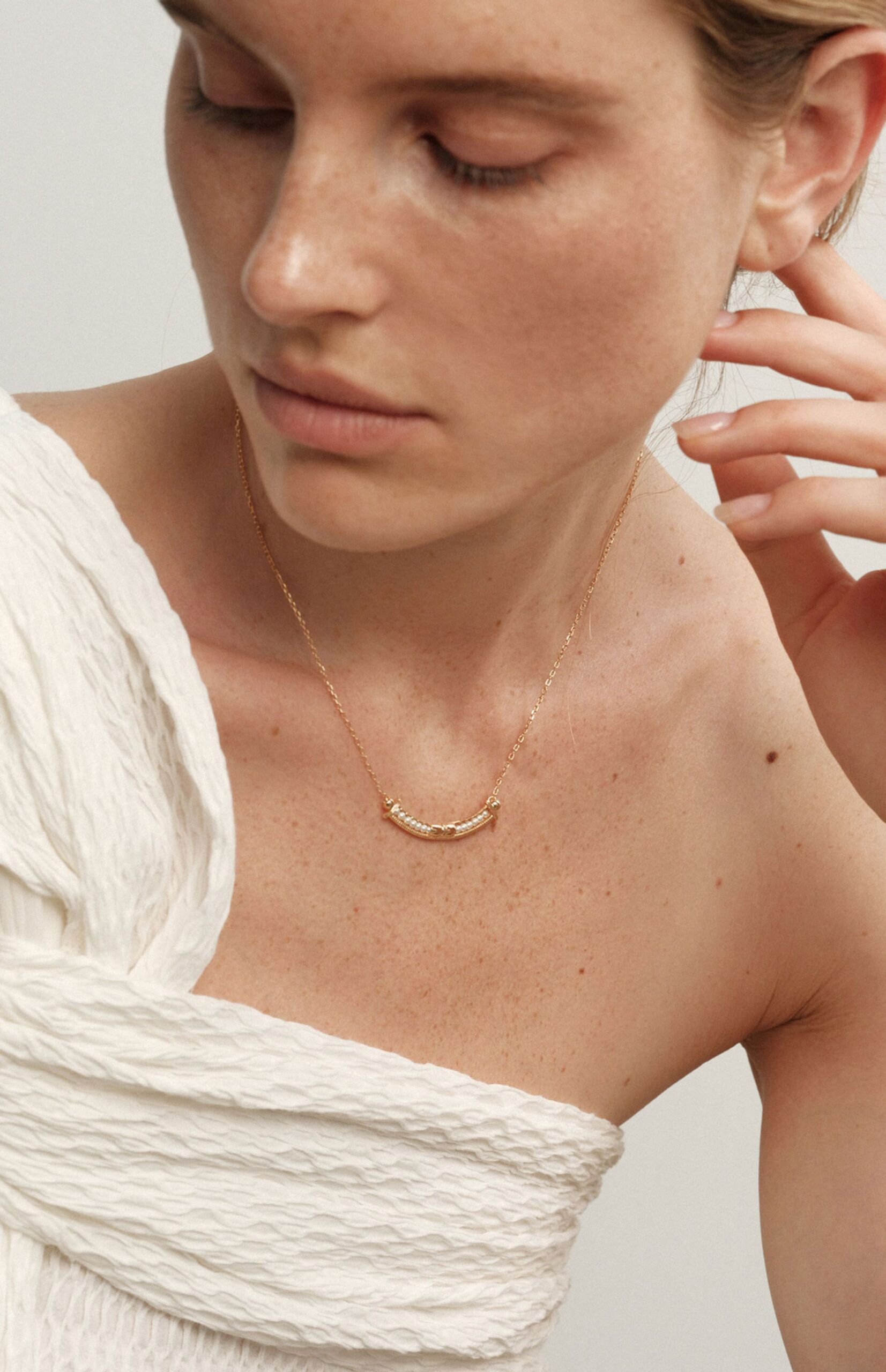 angel’s smile pearl arc necklace angel’s smile pearl arc necklace